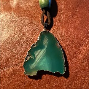 This beautiful green agate necklace is offset with a green colored wood bead.